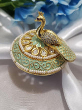 Polki kundan ring with cubic zirconia stone studded rotating peacock
