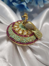 Polki kundan ring with cubic zirconia stone studded rotating peacock