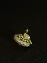 Polki kundan ring with cubic zirconia stone studded rotating peacock