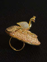 Polki kundan ring with cubic zirconia stone studded rotating peacock