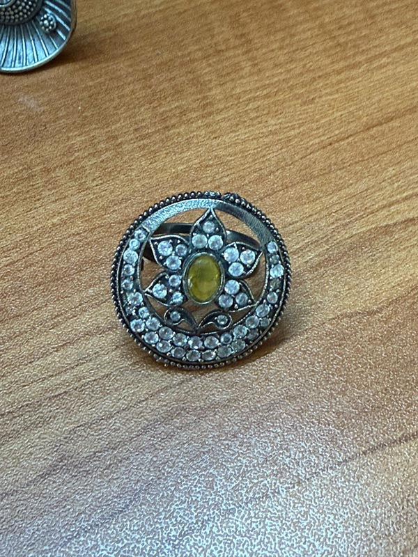 Adjustable German silver ring with yellow and white ad stone
