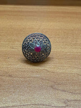 Adjustable German silver ring with red ad stone