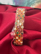 Gold plated bangles intricated with multicolored cubic zirconia stones