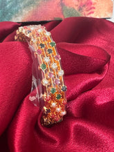 Gold plated bangles intricated with multicolored cubic zirconia stones